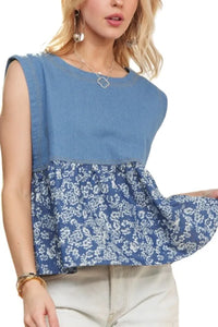Sleeveless denim contrast top from ADORA by Trendsi, featuring a stylish design with contrasting fabric accents.