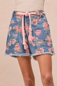Trendsi BiBi braided waist belt with patch pockets on floral print denim shorts, showcasing stylish summer casual wear.