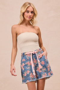 Trendsi BiBi braided waist belt with patch pockets on floral print denim shorts, showcasing stylish casual summer fashion.
