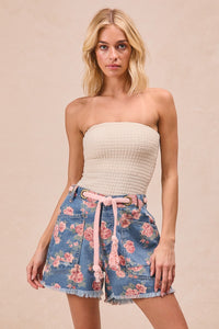 Trendsi BiBi braided waist belt with patch pockets on floral print denim shorts, showcasing stylish casual summer wear.