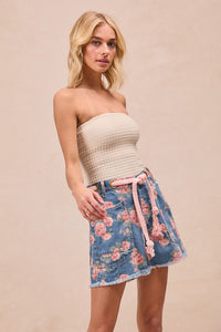 Trendsi BiBi braided waist belt with patch pockets on floral print denim shorts featuring a casual, stylish summer look.
