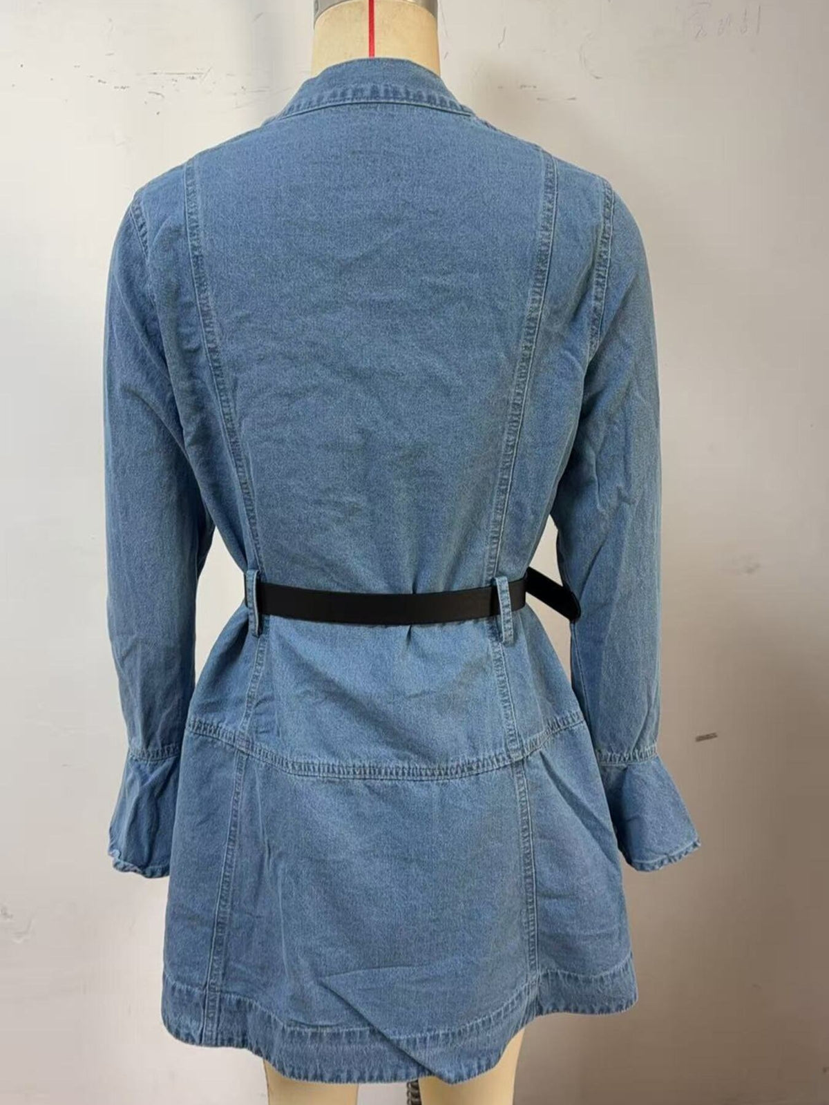 Button front denim dress with flounce sleeves, casual style, from Trendsi, shown on a model with a relaxed fit and classic denim texture.