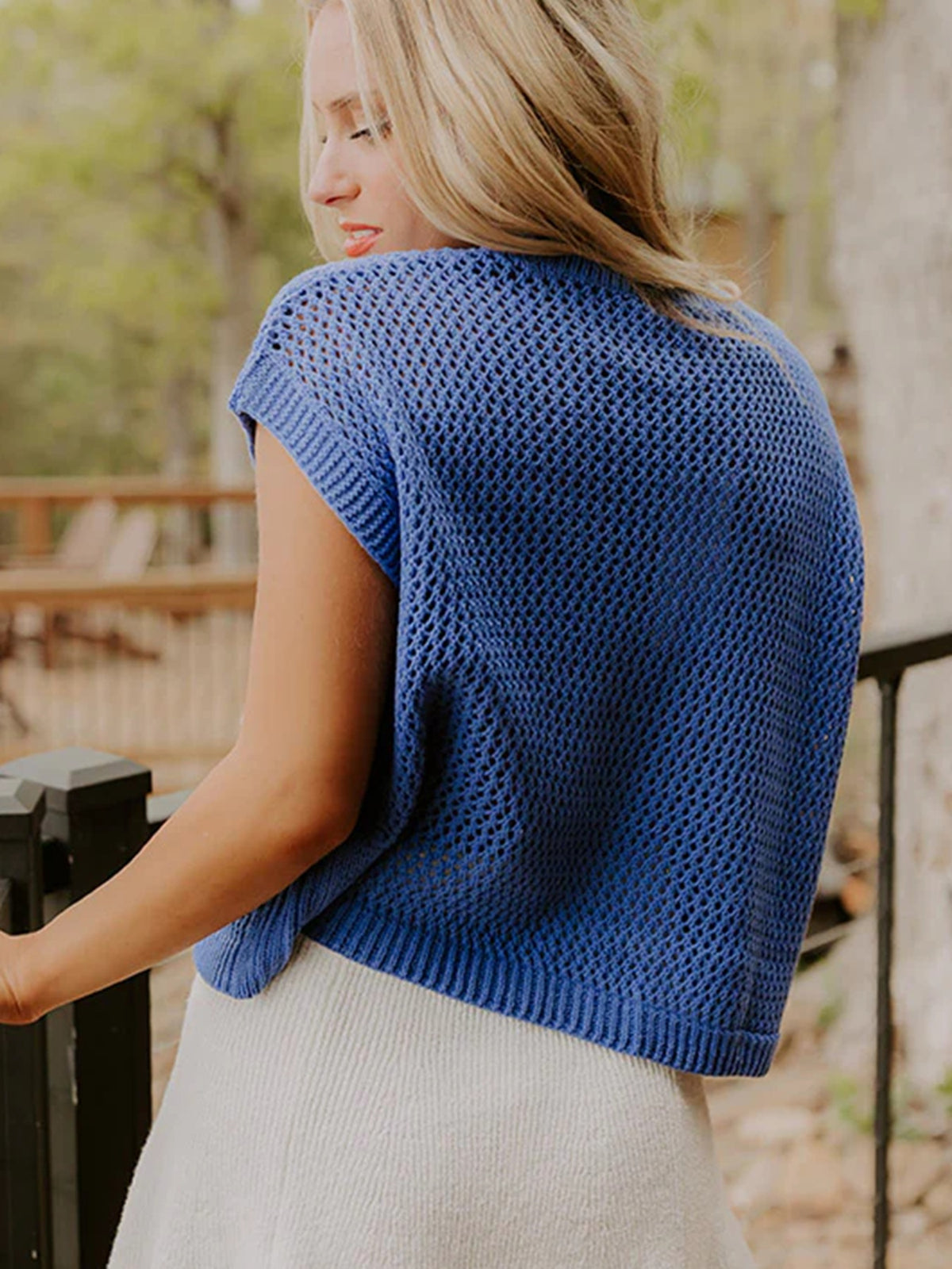 Dusty blue flag graphic short sleeve sweater top by Trendsi, featuring a bold flag design on a cozy knit fabric.