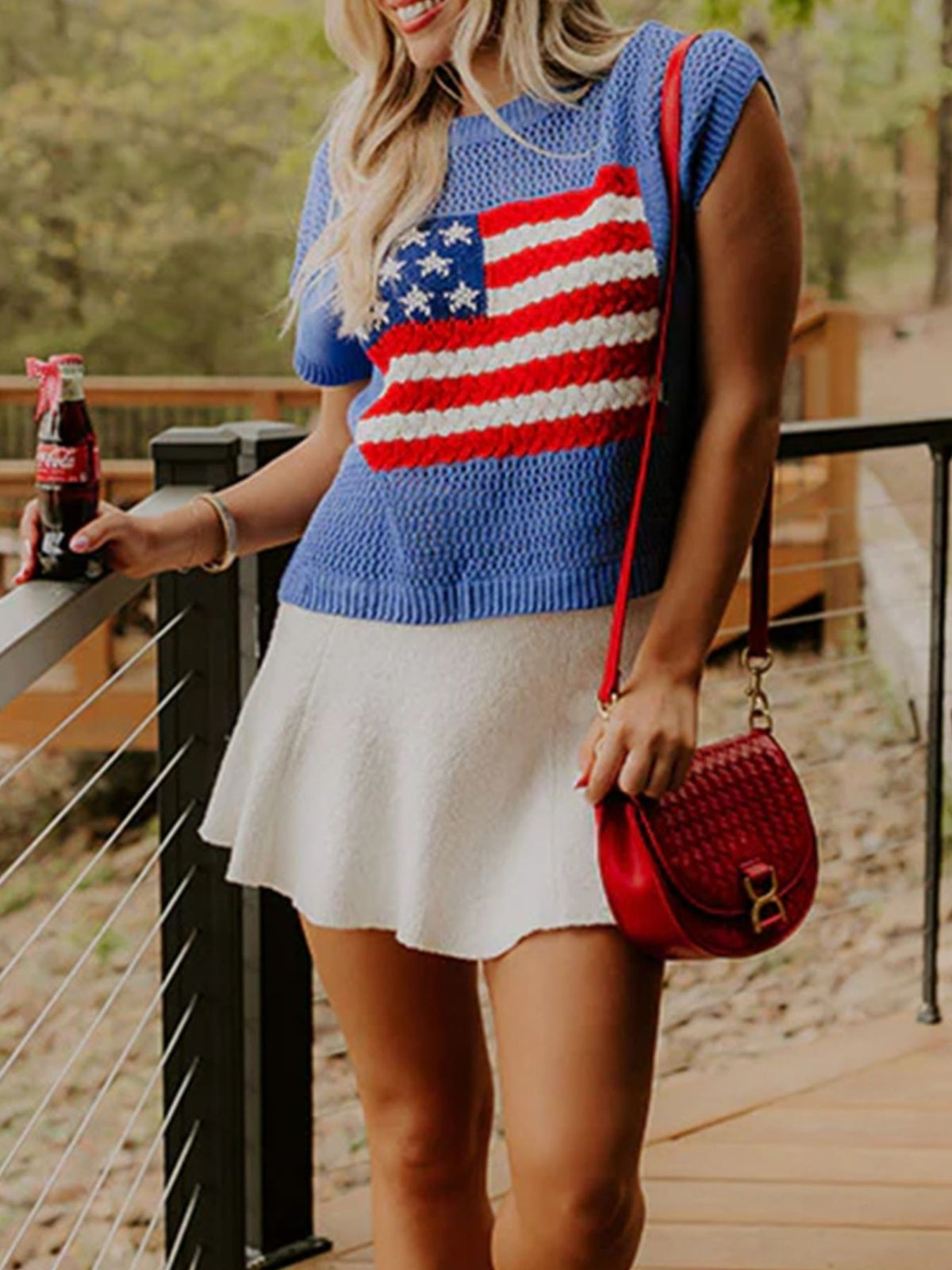 Dusty blue short sleeve sweater top by Trendsi featuring a bold flag graphic design.