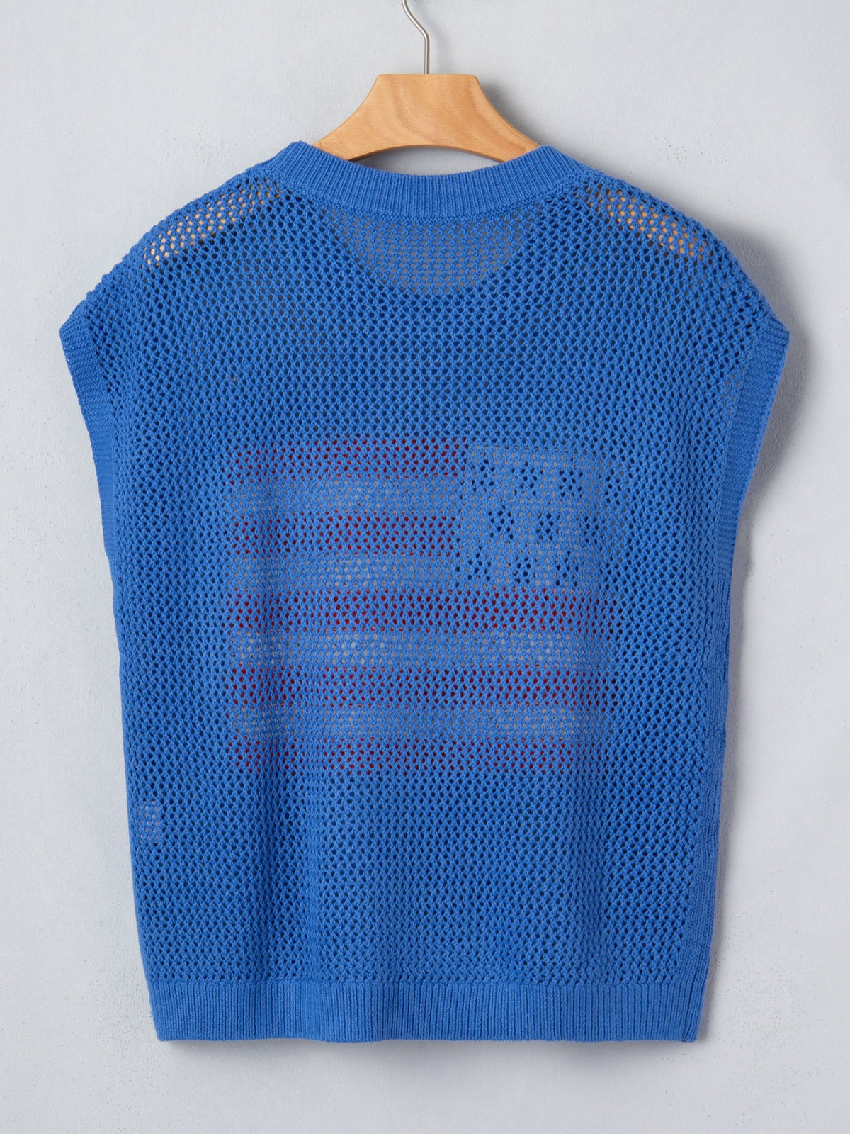 Dusty blue short sleeve sweater top with bold flag graphic design, from Trendsi, casual and stylish for everyday wear.
