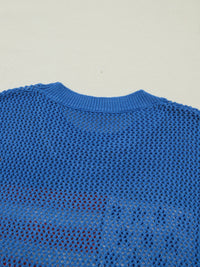 Dusty blue short sleeve sweater top with flag graphic by Trendsi, showcasing a casual, stylish design perfect for everyday wear.