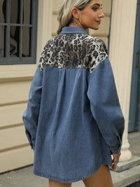 Leopard print button-up long sleeve denim jacket by Trendsi, featuring classic denim fabric with bold leopard pattern details.