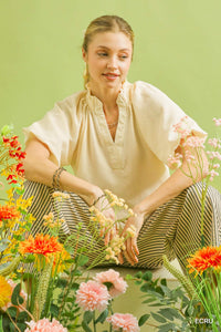 Textured Umgee scalloped hem blouse with long sleeves and relaxed fit, perfect for casual or dressy occasions.