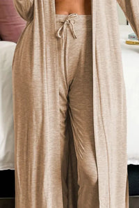 Gray open-front long sleeve cardigan and matching pants lounge set by Trendsi, comfortable casual wear for relaxing at home.