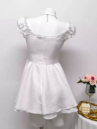Gray and white layered mini dress with ruffle trim, stylish and feminine, perfect for casual or semi-formal occasions.