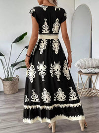 Green printed V-neck dress with ruffled cap sleeves, stylish and lightweight, from Trendsi.