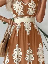Green printed V-neck dress with ruffled cap sleeves by Trendsi, showcasing a stylish and feminine design.