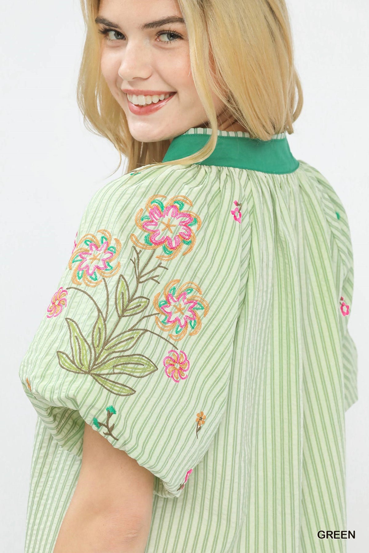 Umgee embroidered stripe top featuring colorful patterns and lightweight fabric, perfect for casual wear.
