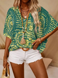 Trendsi hot pink printed V-neck half sleeve top, stylish and comfortable women's casual shirt with vibrant pattern.