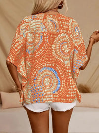 Hot pink printed V-neck half sleeve top by Trendsi, featuring a stylish design and comfortable fit.
