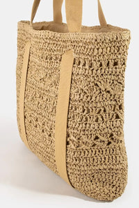 Large straw braided tote bag with hat holder, trendy and spacious, perfect for summer outings and beach trips.