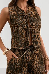 Leopard print sleeveless denim top by Trendsi, featuring a fitted design and classic animal print pattern.