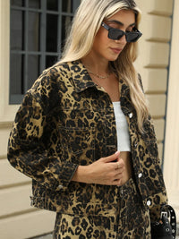 Leopard print long sleeve denim jacket with front pockets by Trendsi, featuring a stylish and casual design.