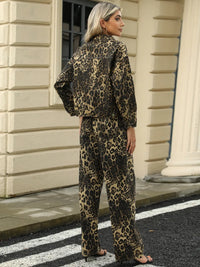 Leopard print long sleeve denim jacket with front pockets from Trendsi, featuring a stylish and trendy design.