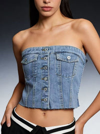 Light blue button-front strapless denim top from Trendsi, featuring a fitted design and sleeveless style.