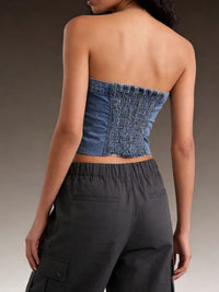 Light blue button-front strapless denim top from Trendsi featuring a fitted design and sleeveless style.