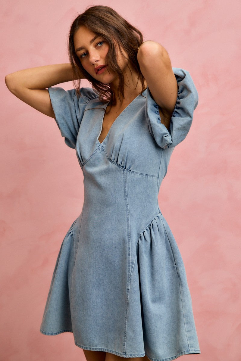 Light denim SO ME Bubble Sleeves fit and flare mini dress featuring long puffed sleeves and a stylish, casual silhouette.
