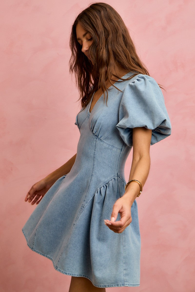 Light denim fit and flare mini dress with bubble sleeves from Trendsi, featuring a stylish and casual silhouette.