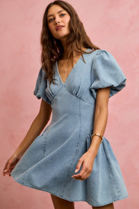 Light denim fit and flare mini dress with bubble sleeves from SO ME by Trendsi, showcased on a model.