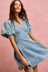 Light denim SO ME bubble sleeves fit and flare mini dress by Trendsi, showcasing a stylish, casual denim dress with puffed sleeves.