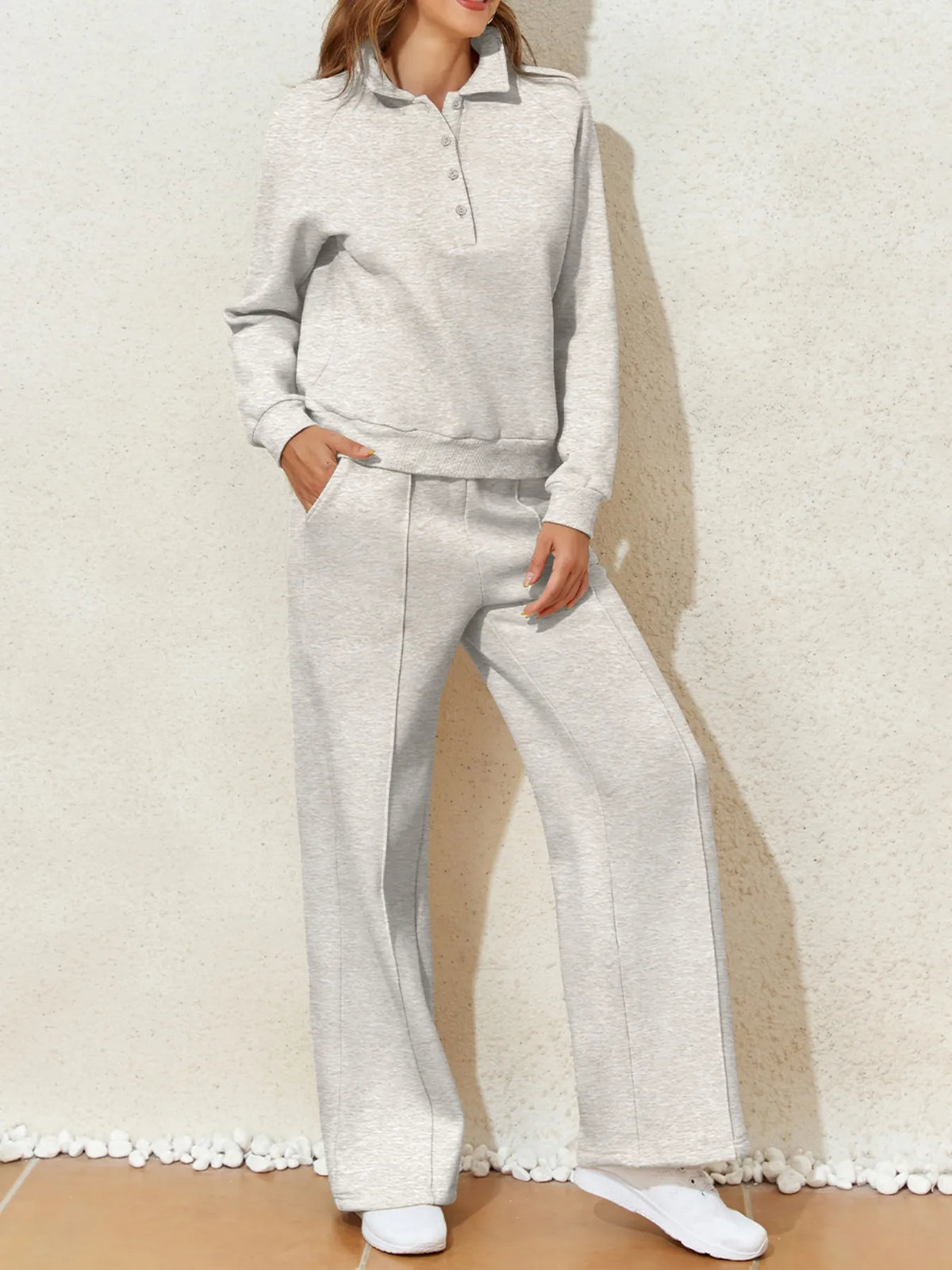 Light gray collared sweatshirt and high-waist pants active set by Trendsi, casual athletic wear for comfortable style.
