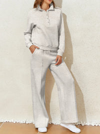 Light gray collared sweatshirt and high-waist pants active set by Trendsi, casual athletic wear for comfortable style.