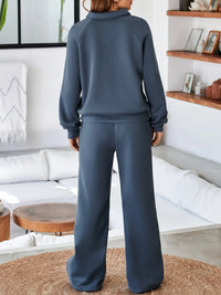 Light gray collared sweatshirt and high-waist pants active set by Trendsi, comfortable athletic wear for casual or workout use.