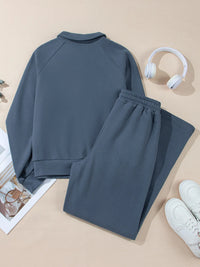 Light gray collared sweatshirt and high-waist active pants set by Trendsi, casual loungewear with a comfortable fit.