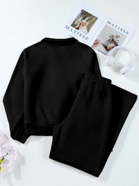 Light gray collared sweatshirt and high-waist pants active set by Trendsi, casual athletic wear for comfortable style.