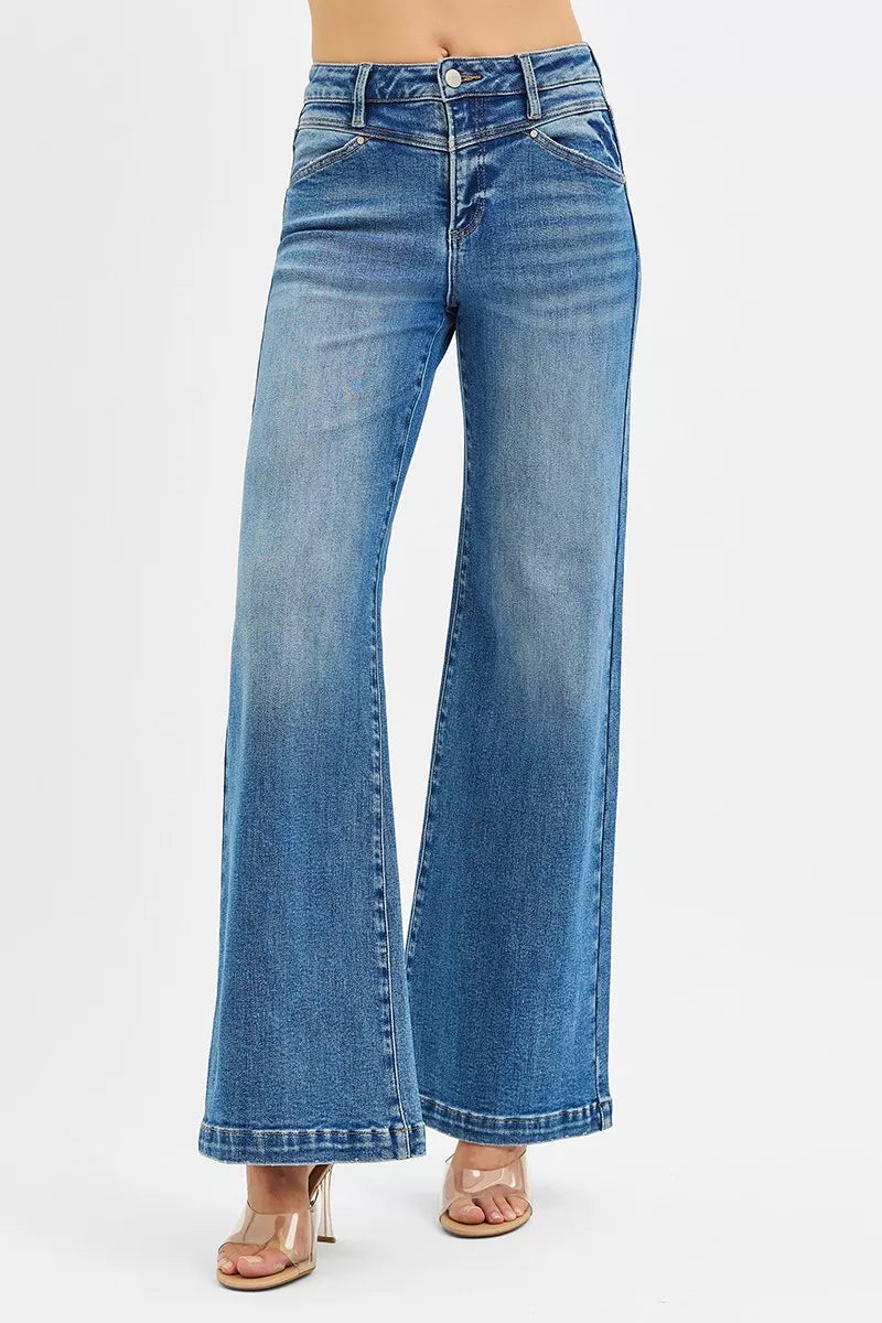 Trendsi RISEN high-rise wide-leg jeans with front yoke and heart-shaped back pockets, denim fabric, and relaxed fit.