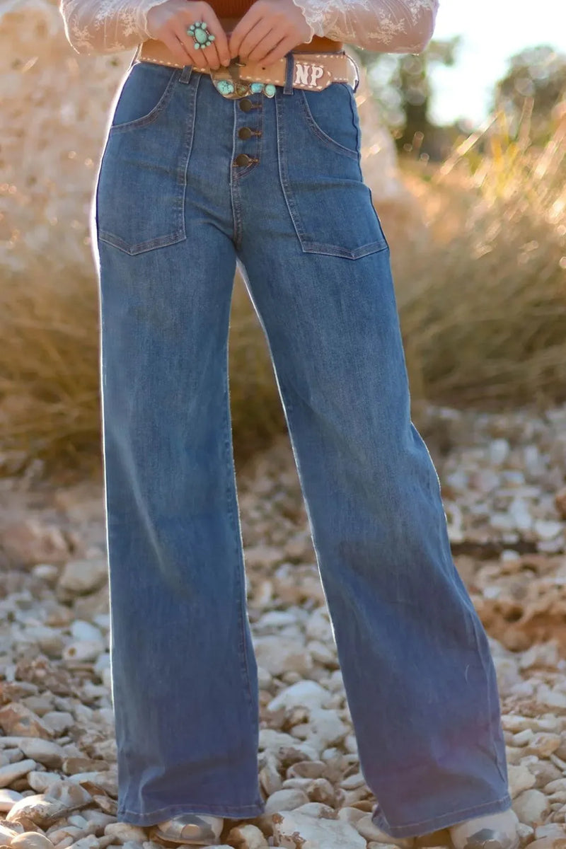 High-waisted wide-leg button-front jeans from Trendsi, showcasing classic denim with a relaxed fit and stylish silhouette.