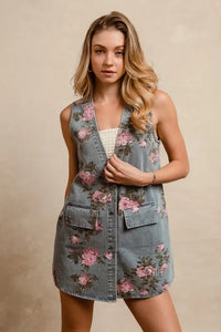 BiBi floral print washed denim long rider vest by Trendsi, featuring colorful floral patterns and a casual denim design.