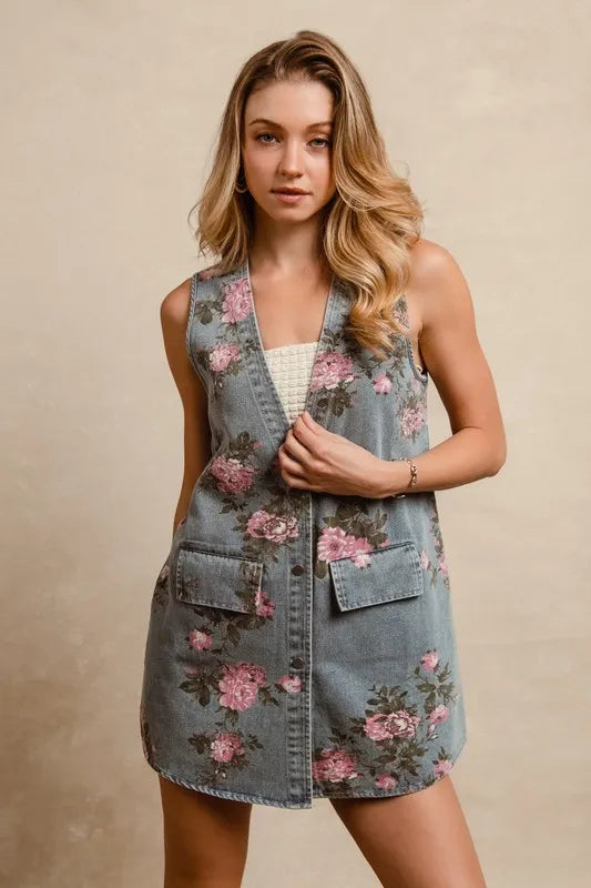 BiBi floral print washed denim long rider vest by Trendsi, featuring colorful floral patterns and a casual denim design.