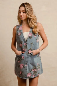 BiBi floral print washed denim long rider vest by Trendsi, featuring a stylish floral pattern and classic denim texture.