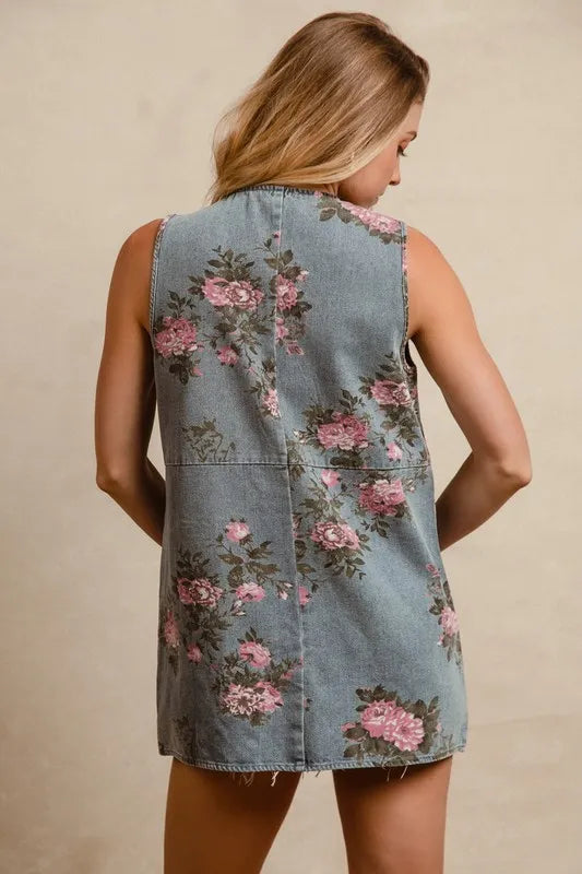 BiBi floral print washed denim long rider vest by Trendsi, featuring a lightweight denim design with floral patterns and a relaxed fit.