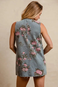 BiBi floral print washed denim long rider vest by Trendsi, featuring a lightweight denim design with floral patterns and a relaxed fit.