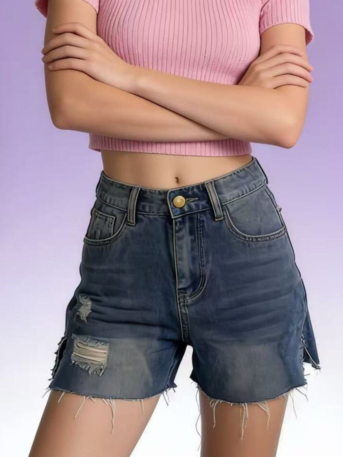 Distressed slit denim shorts from Trendsi featuring frayed edges and a casual fit, shown on a model.