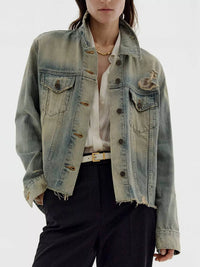Distressed wash button-up denim jacket from Trendsi, showing the front view with a casual, vintage-inspired style.