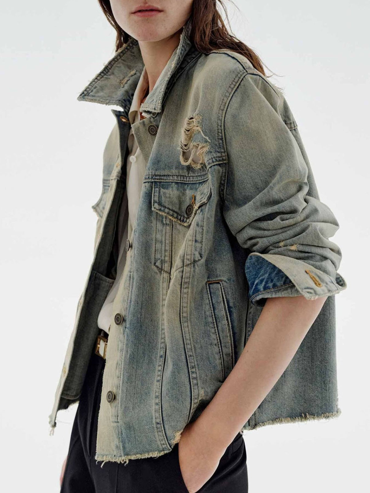 Distressed wash button-up denim jacket by Trendsi, featuring a casual fit with faded details and metal buttons.