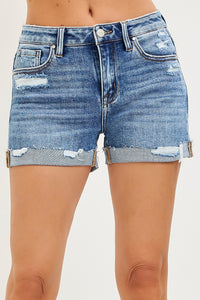 Risen mid-rise cuffed denim shorts by Trendsi, showcasing rolled-up hem and classic blue wash, perfect for casual summer wear.