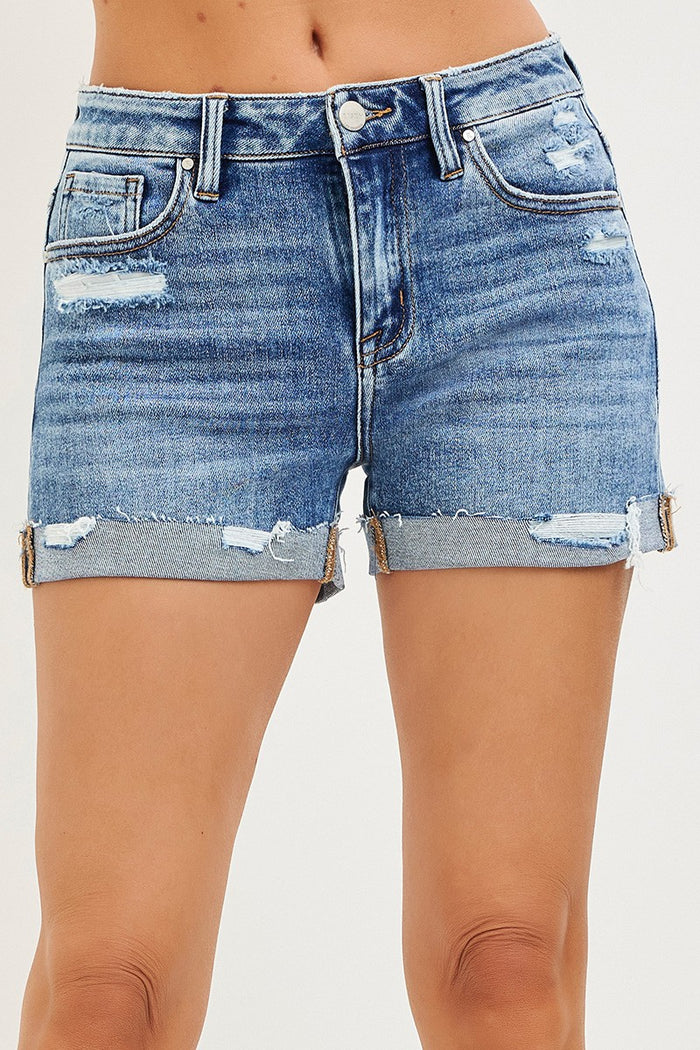 Risen mid-rise cuffed denim shorts by Trendsi, showcasing rolled-up hem and classic blue wash, perfect for casual summer wear.