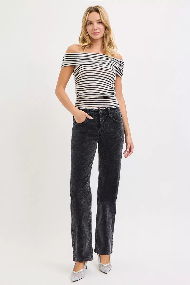 Mid-rise Risen corduroy pants with tummy control and straight-leg fit in midnight color, shown on a model.
