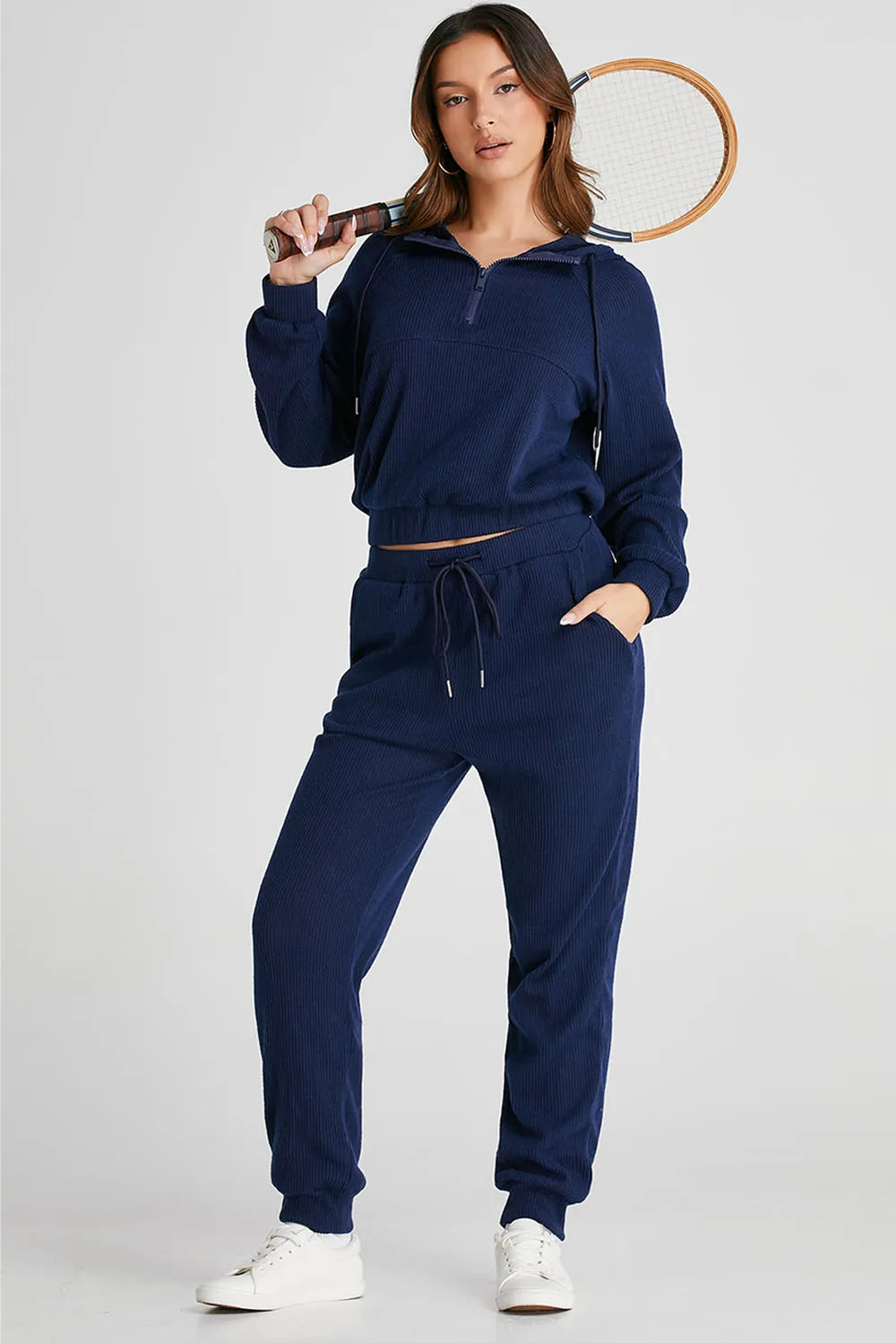 Drawstring half-zip hoodie and matching joggers active set by Trendsi, featuring comfortable fabric and casual style.