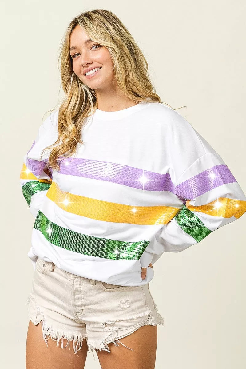BiBi Sequin Mardi Gras striped round neck sweatshirt by Trendsi, featuring colorful sequin stripes and a casual fit.
