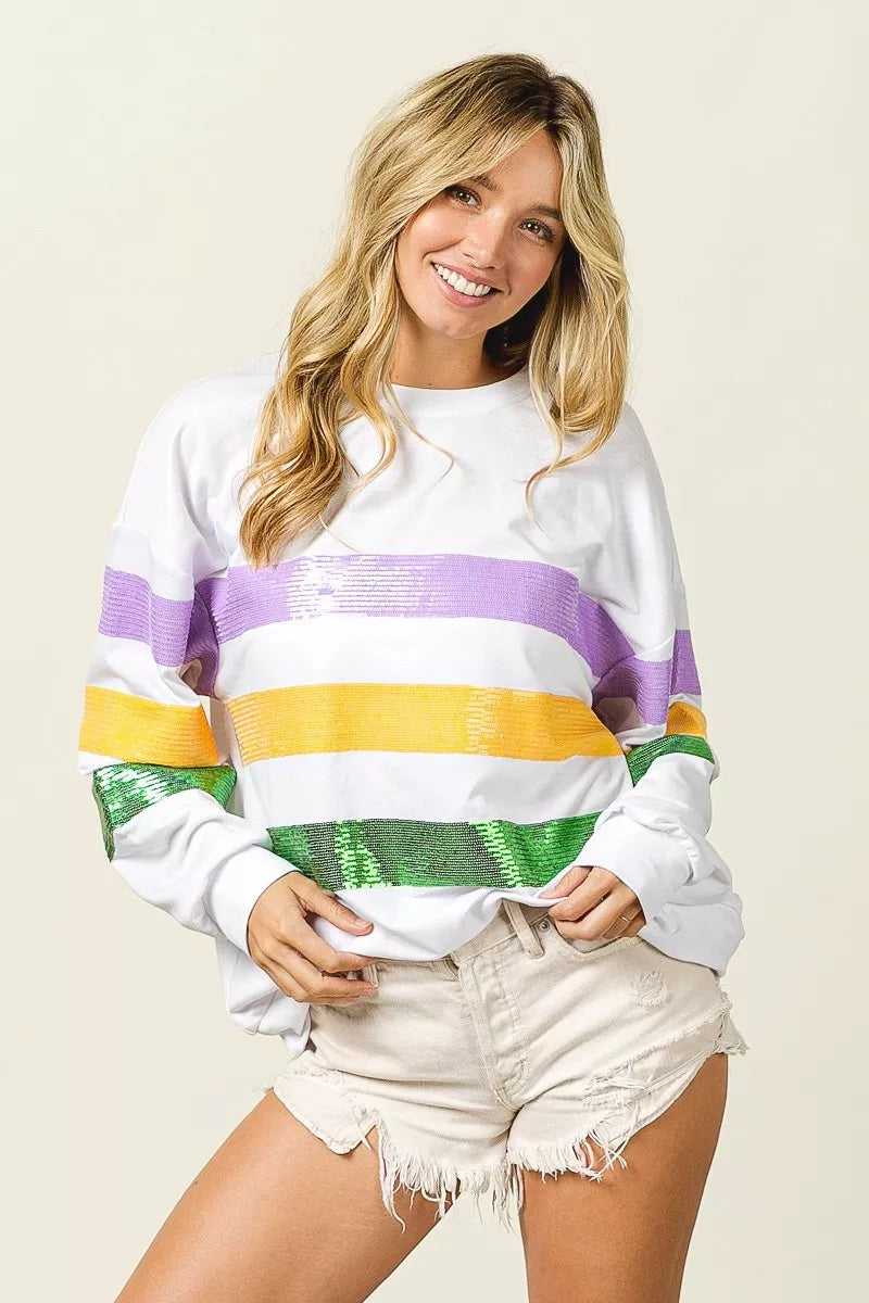 Sequin Mardi Gras striped round neck sweatshirt by Trendsi featuring colorful sequins and casual fit, perfect for festive occasions.
